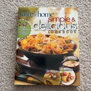 Taste of Home Simple & Delicious Cookbook with Vibrant Orange and Green Cover